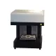Industrial food printer creating personalized high-resolution edible designs on cakes, pizzas, and beverages.