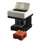 Industrial food printer creating personalized high-resolution edible designs on cakes, pizzas, and beverages.