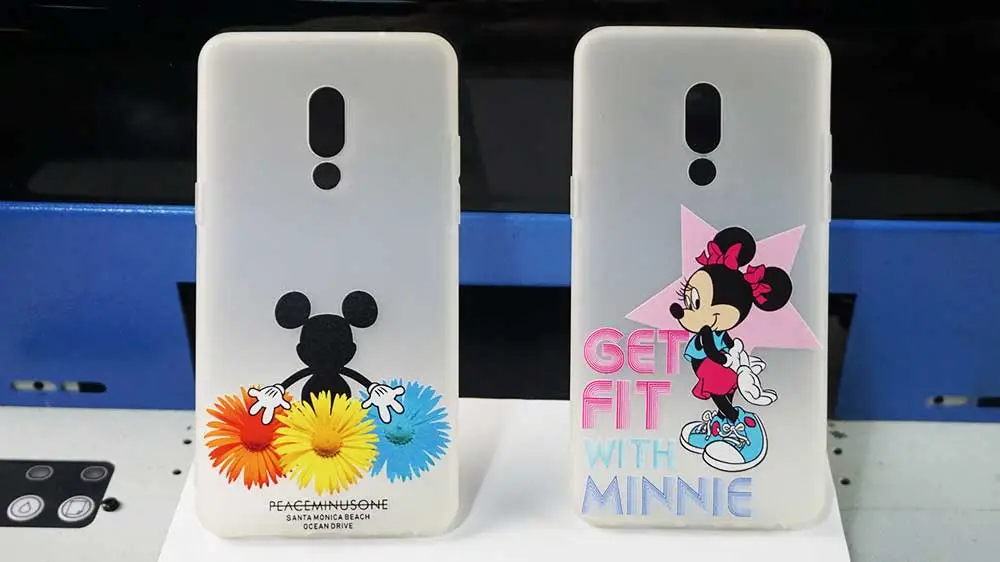 Custom phone case and acrylic printing samples with vibrant colors
