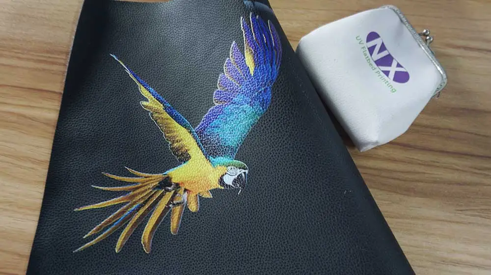 Multi-material UV printing on leather and rigid substrates