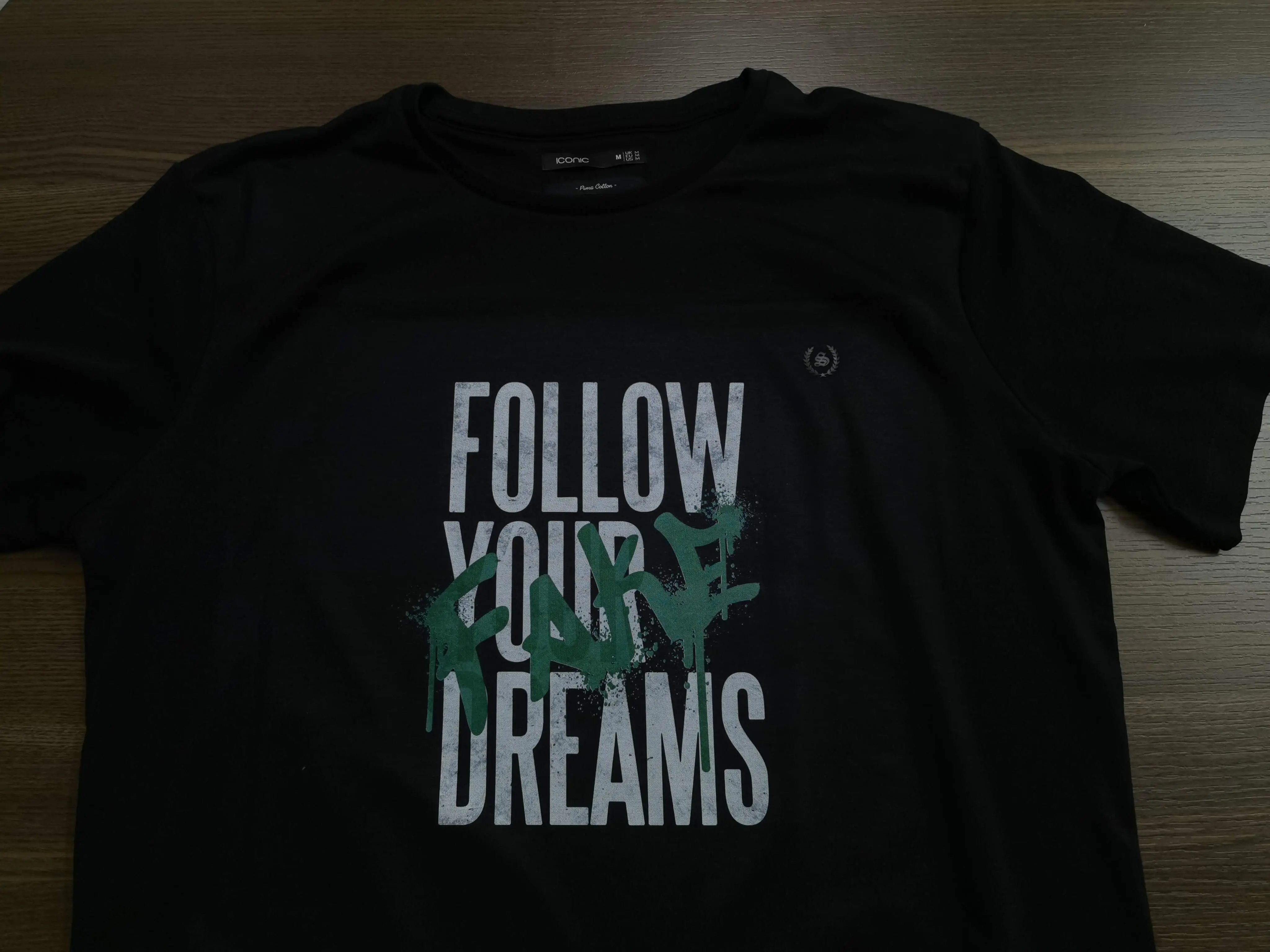 Deep rich blacks and vibrant details on custom cotton apparel